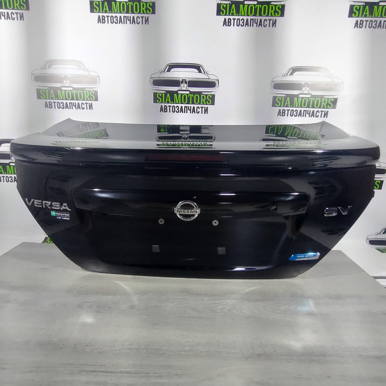 Кришка багажника Nissan Versa 12-19 usa під спойлер, черний (КH3) H4300-9KAME