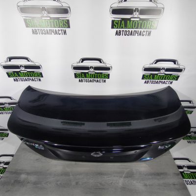 Кришка багажника Nissan Versa 12-19 usa під спойлер, черний (КH3) H4300-9KAME
