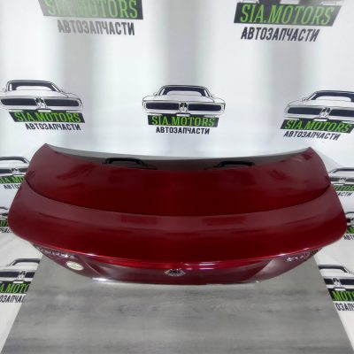 Кришка багажника Nissan Versa 12-19 usa під спойлер, червоний (NAH) H4300-9KAME