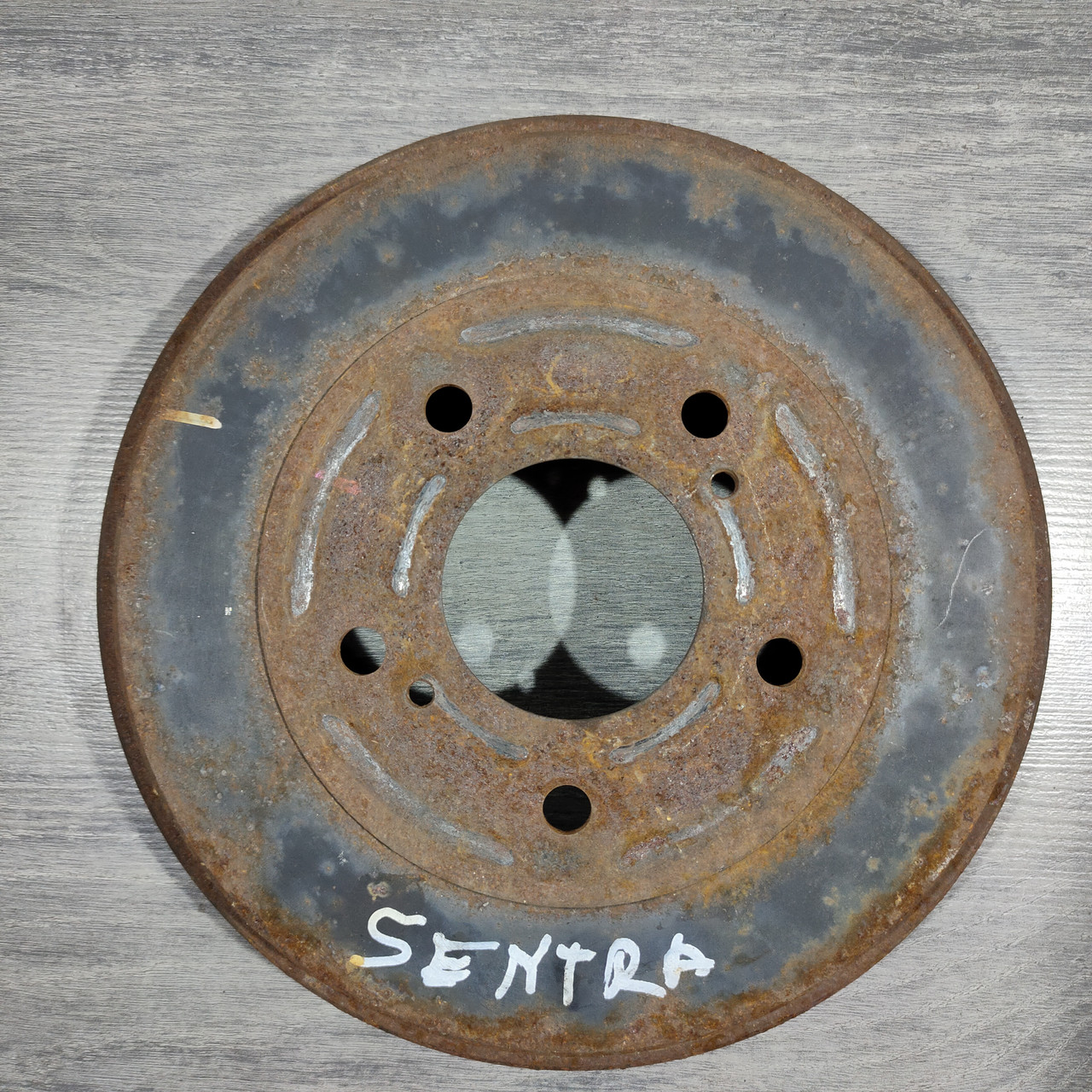 Барабан гальмівний задній лівий (Ржавій) Nissan Sentra 13-19 203 мм 43206-3SG0C