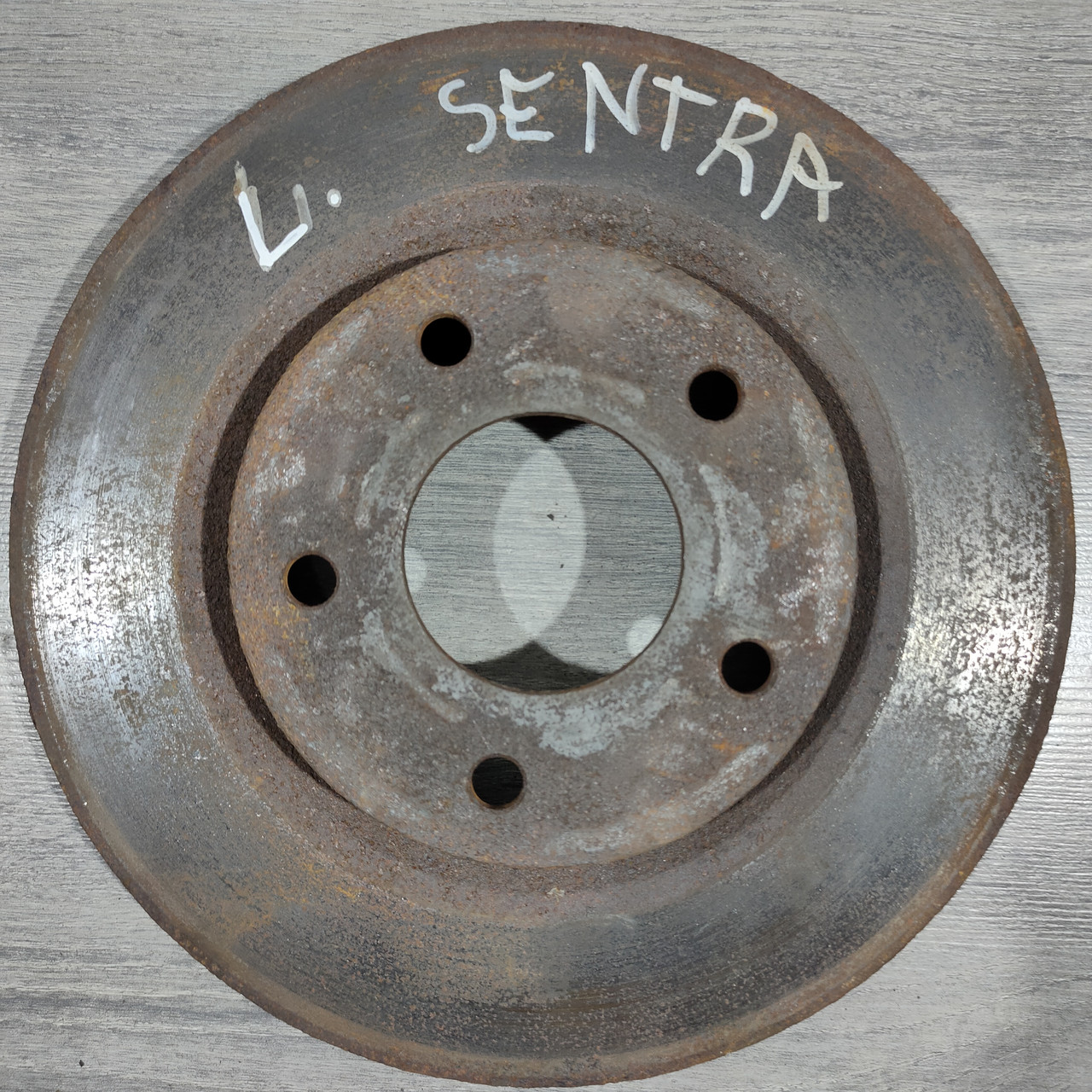 Диск гальмівний передній лівий Nissan Sentra 13-19 1.8 40206-3SG0B