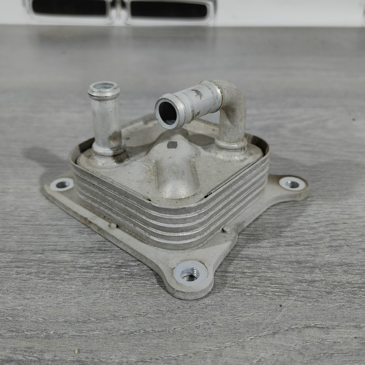 Оливний охолоджувач ДВС Nissan Sentra 13-19 1.8 21305-3RC1A