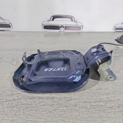 Лючок бензобака Nissan Sentra 13-19 синій G8830-9ANMA